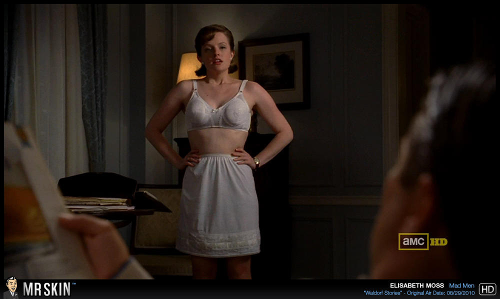naked women from mad men tea leoni black miniskirt
